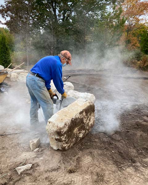 bob carving stone wall